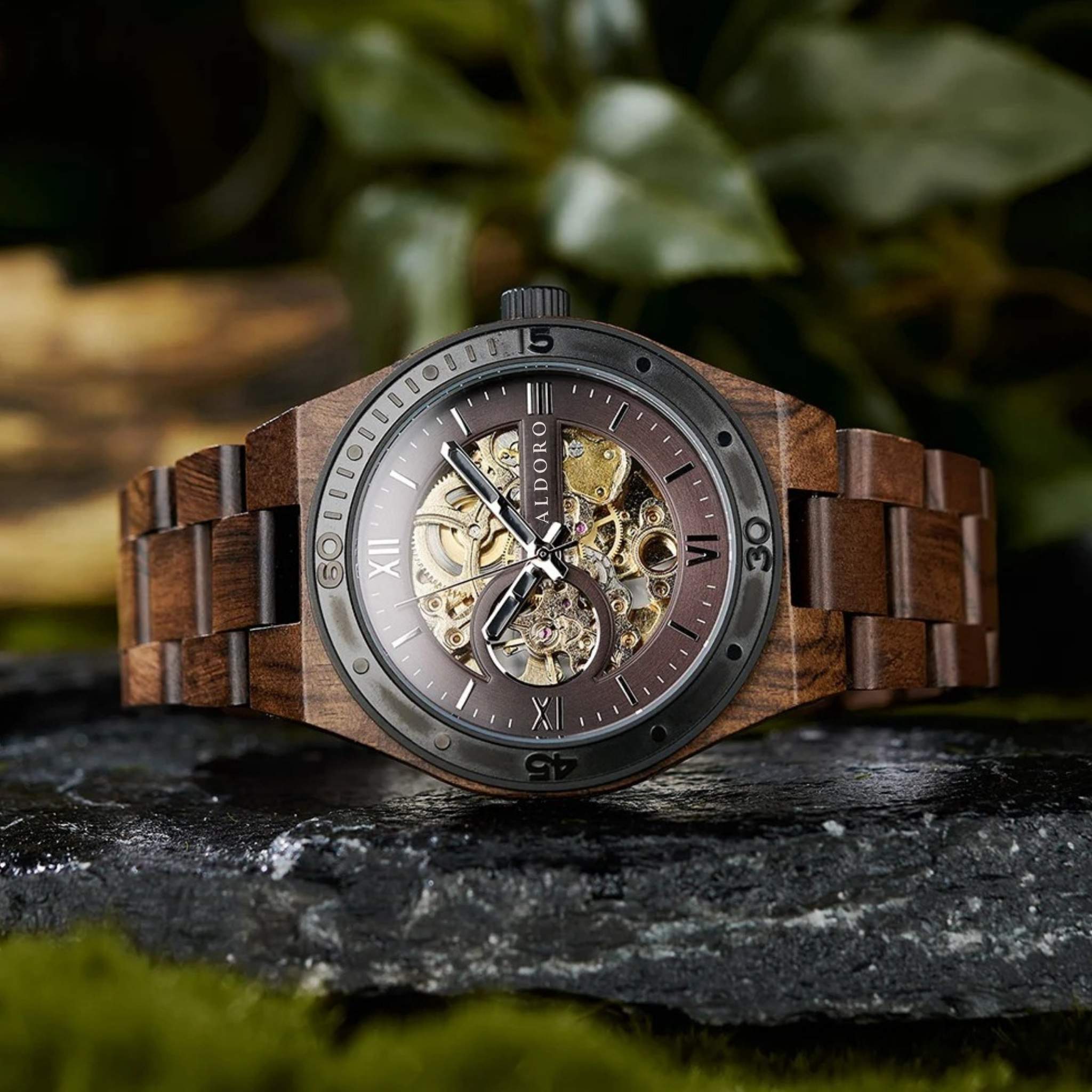 Front view of Aldoro luxury wooden watch featuring an open-heart dial showcasing intricate mechanical movements, crafted from rich natural wood.